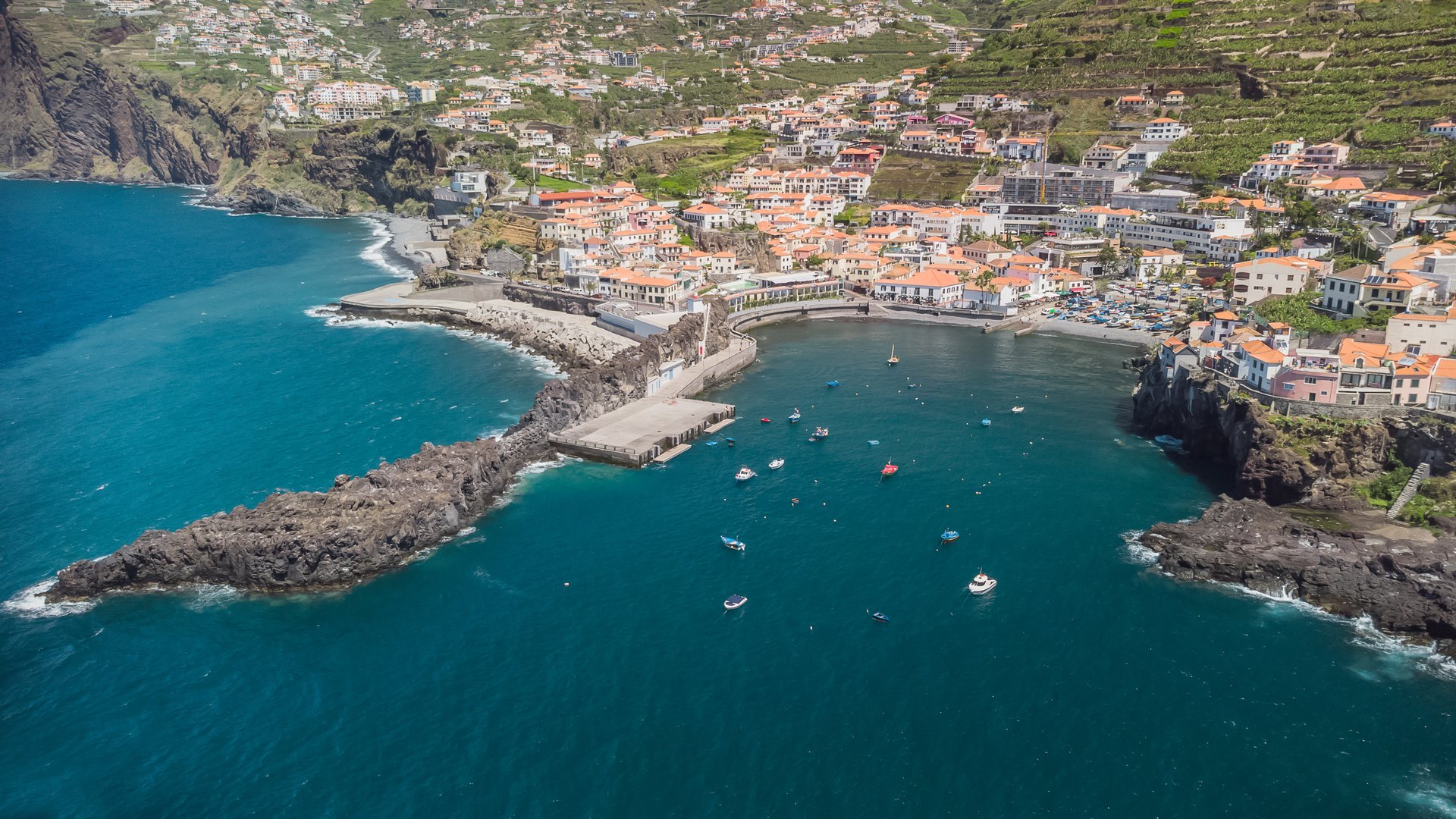 Aerial view of Câmara de Lobos and the turquoise Madeira coastline